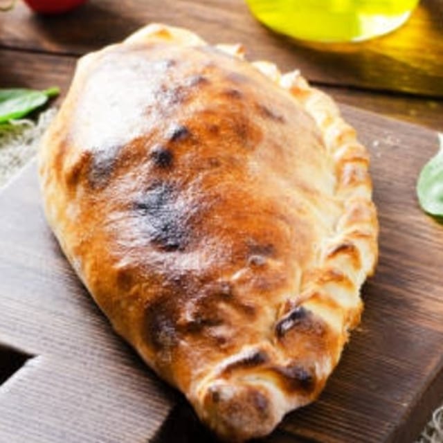 Ham, Ricotta, and Mozzarella Calzone.